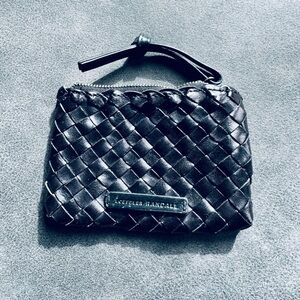 Loeffler Randall leather bag. NWT.
Zip closes. Black leather.